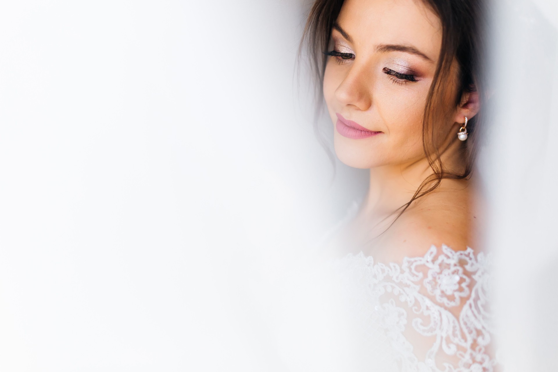 Close-up of the face of the bride with a beautiful make-up on th